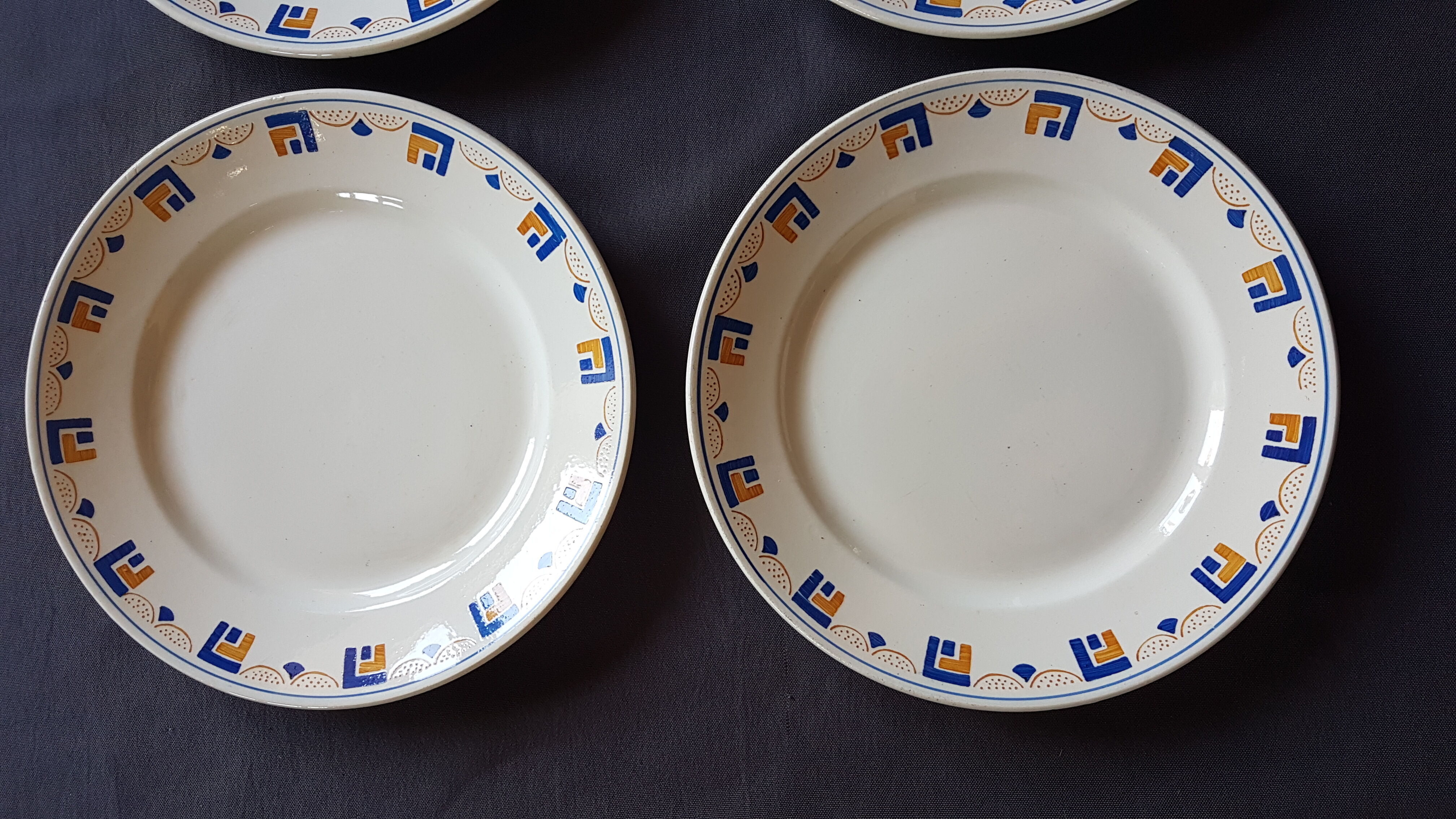 Suite of 4 plates made of Lunéville earthenware