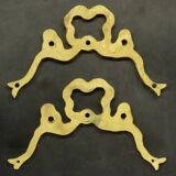 Pair of pediments with Louis XVI style knot in gilded bronze