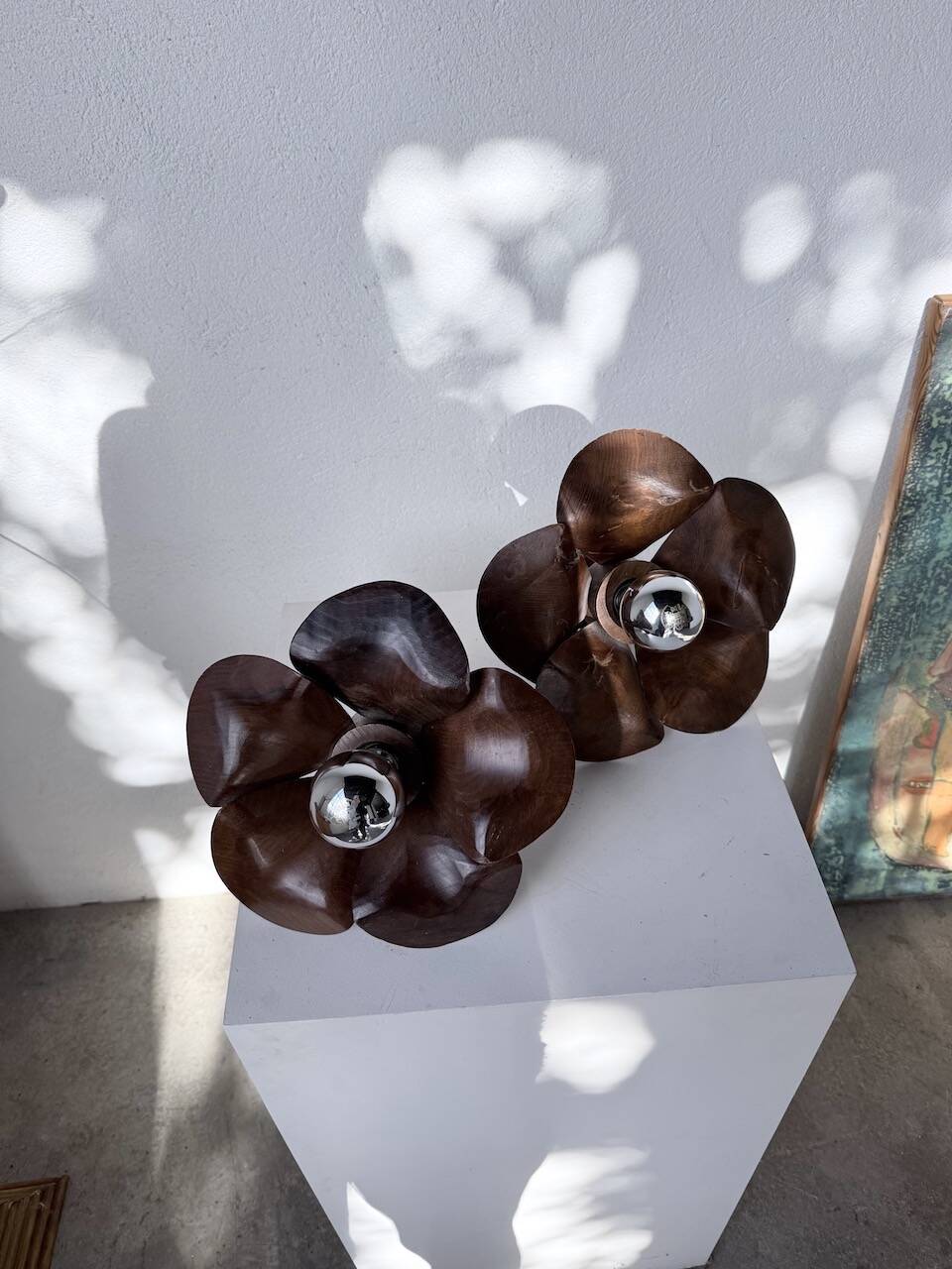 Pair of wooden flower wall lights from the 1970s.