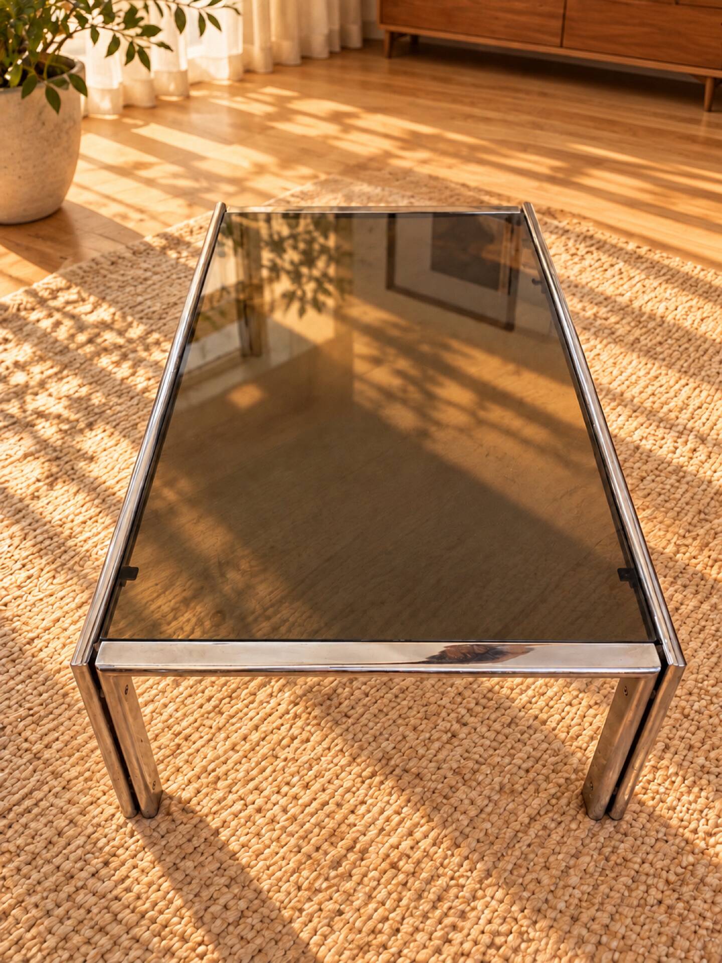 Vintage coffee table in chrome and smoked glass – 1970s/80s