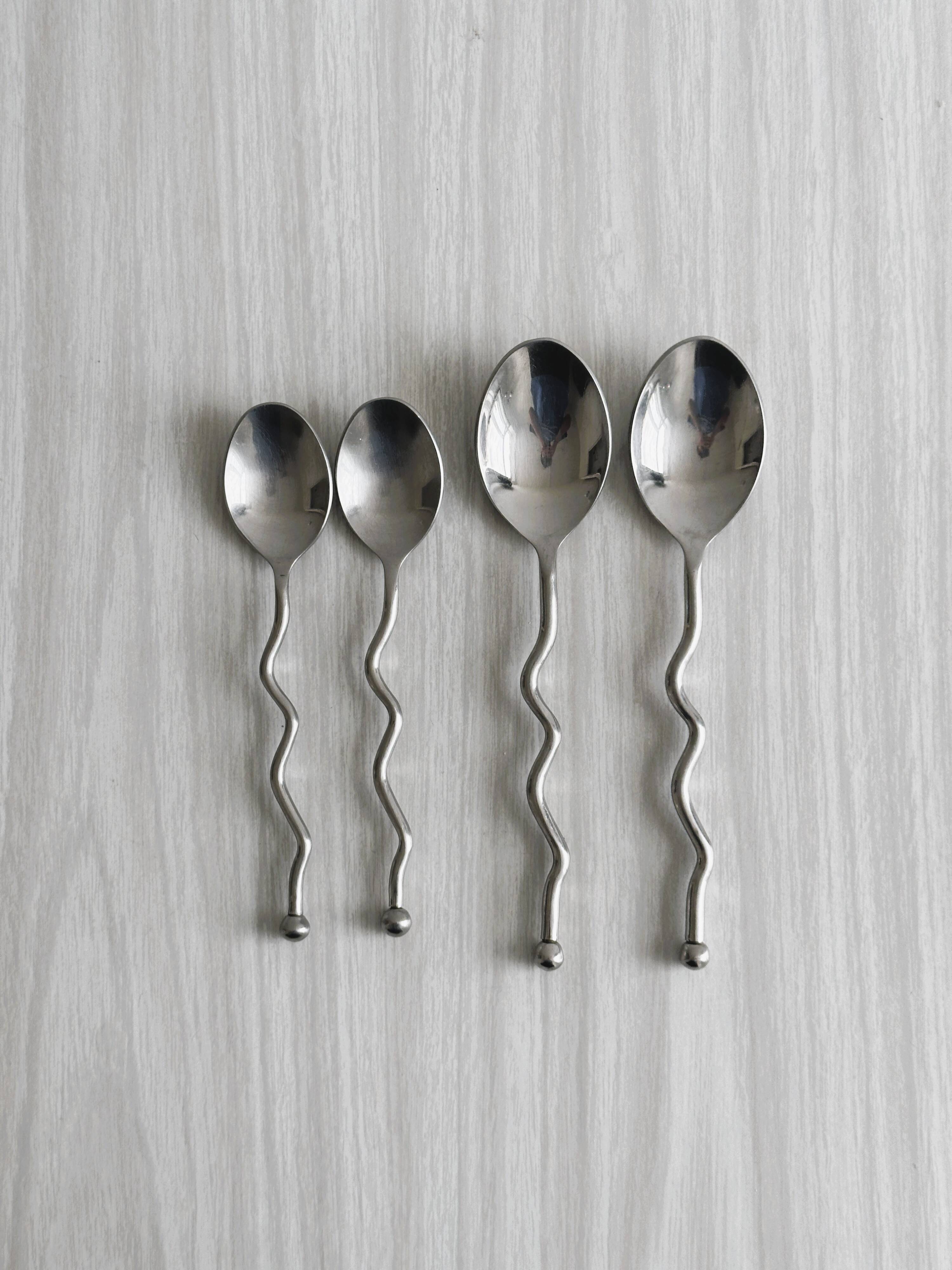 Set of 4 silver-plated metal spoons