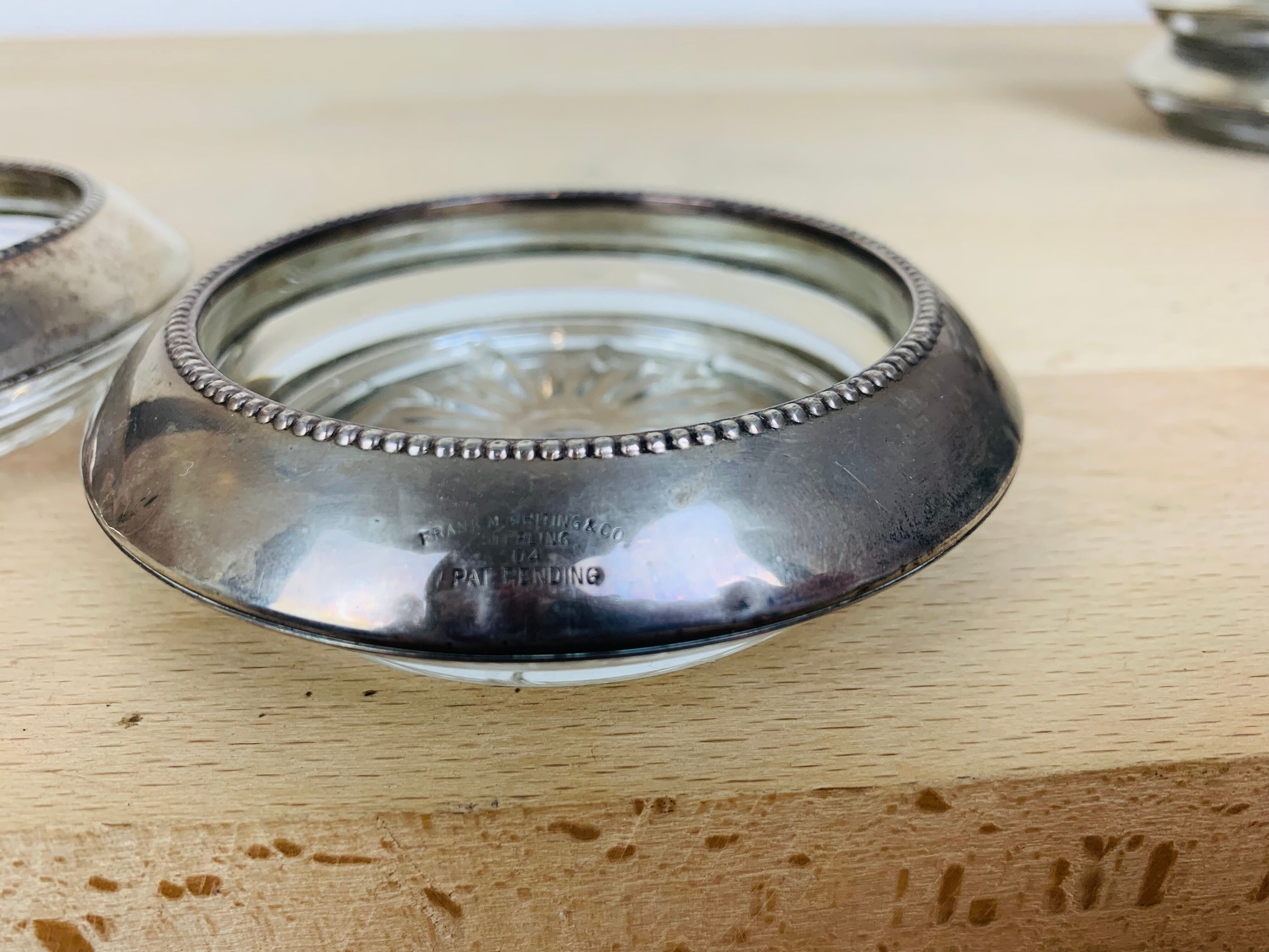 5 silver metal coasters Frank Whiting & Co