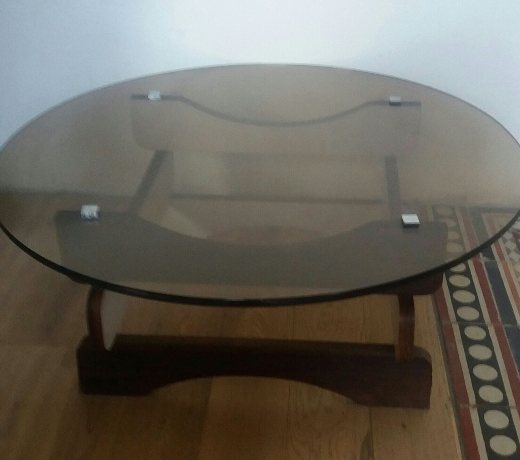 Coffee table of smoked glass and wood of the 1970s