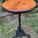 Pedestal table with inlaid top and flower decoration