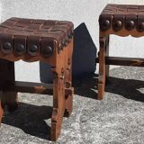 Pair of brutalist stools, leather seat.