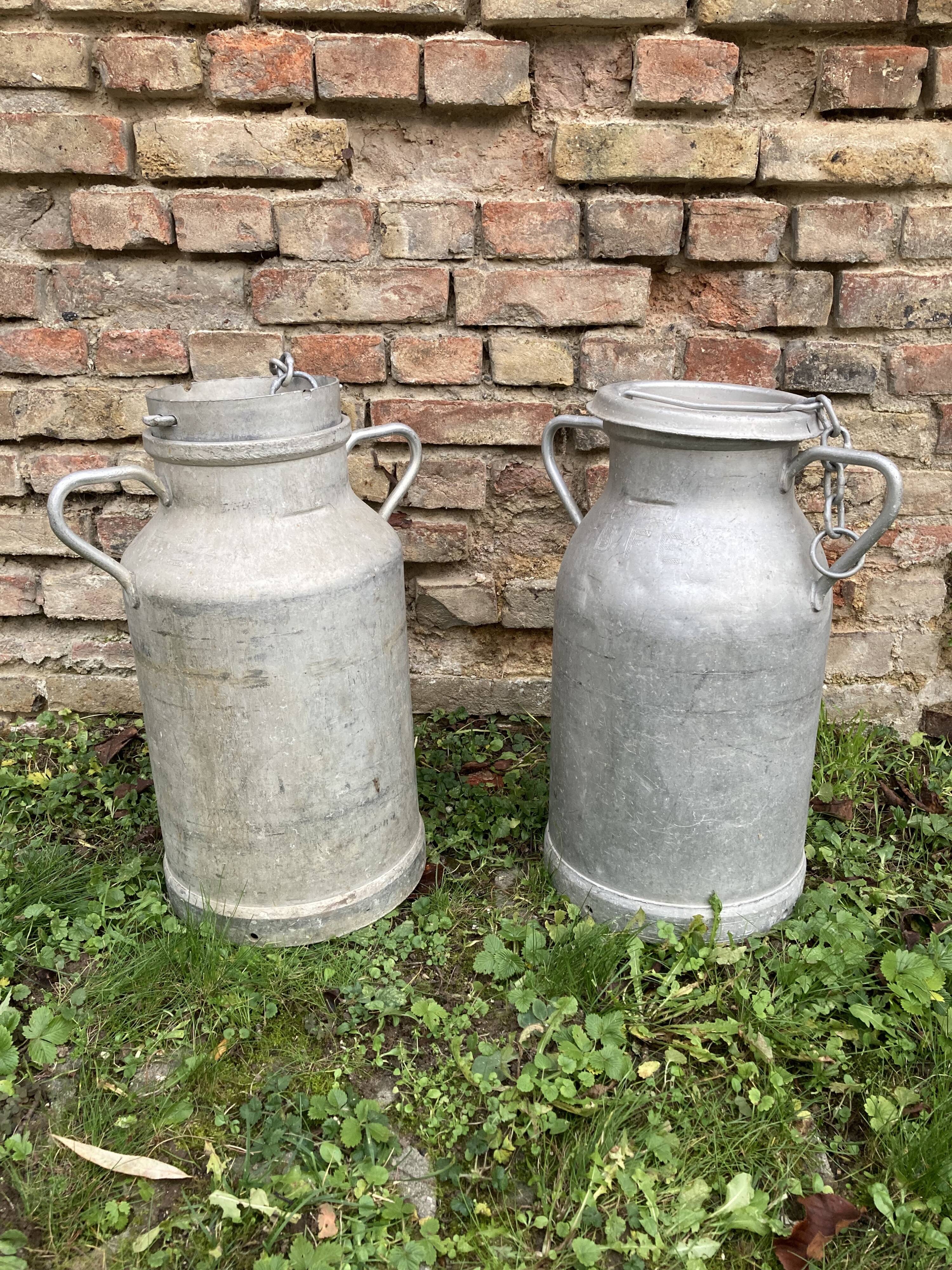 Pair of farm milk jars aluminum cans