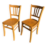 Pair of honey-colored luterma bistro chairs