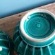 Emerald green glazed ceramic ribbed bowls