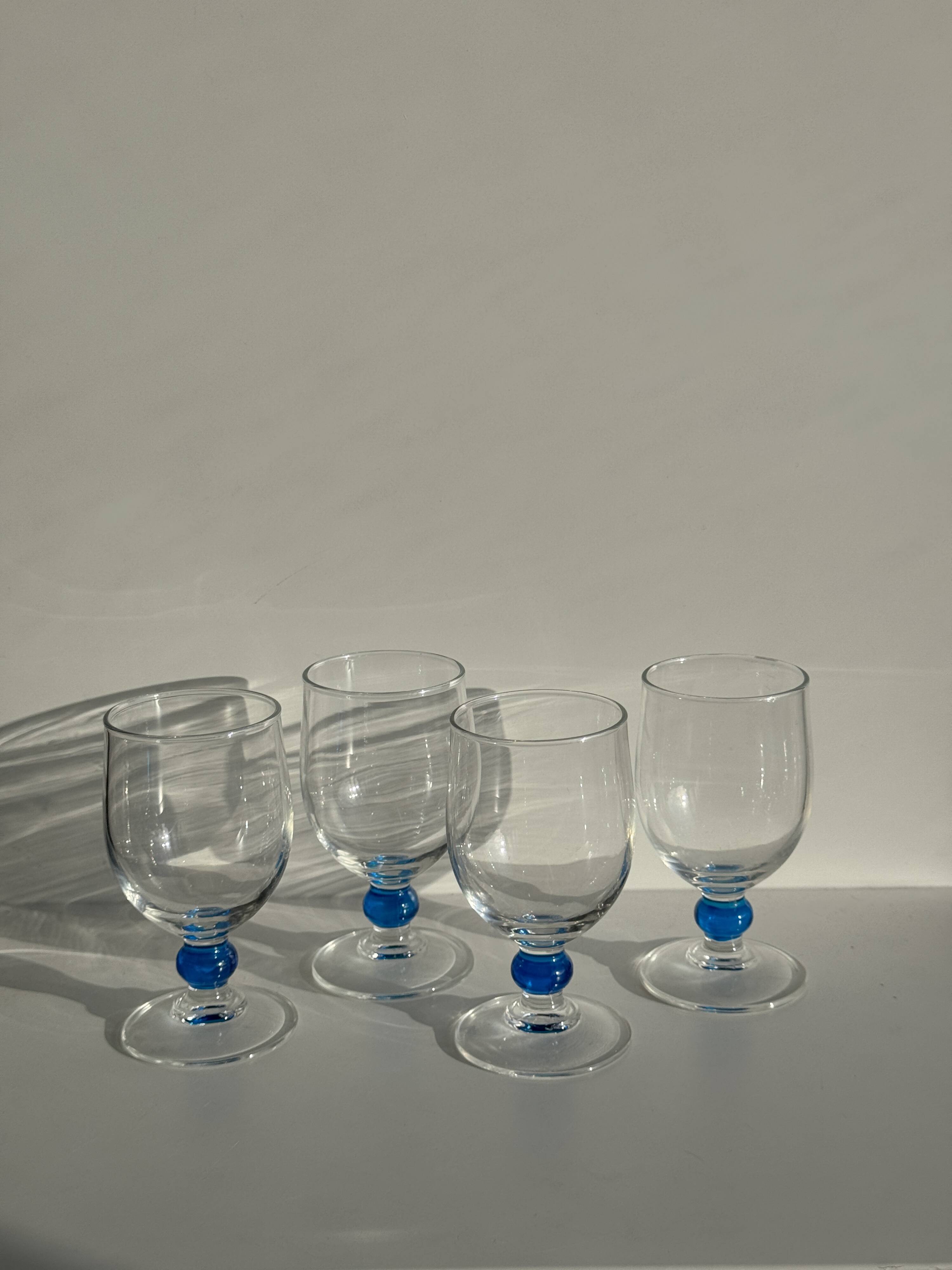 Set of 4 blue ball stemmed water glasses