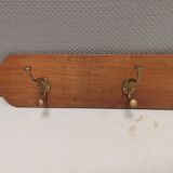 Coat rack in teak and brass. Denmark 1970-80s