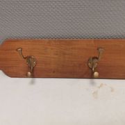 Coat rack in teak and brass. Denmark 1970-80s
