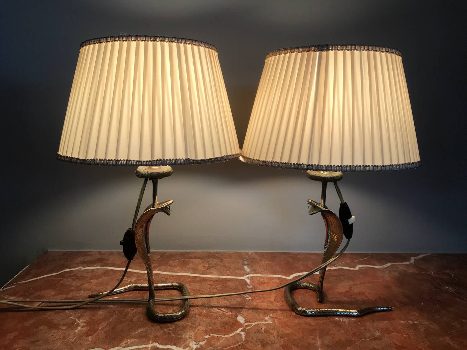 Magnificent pair of cobra bedside lamps