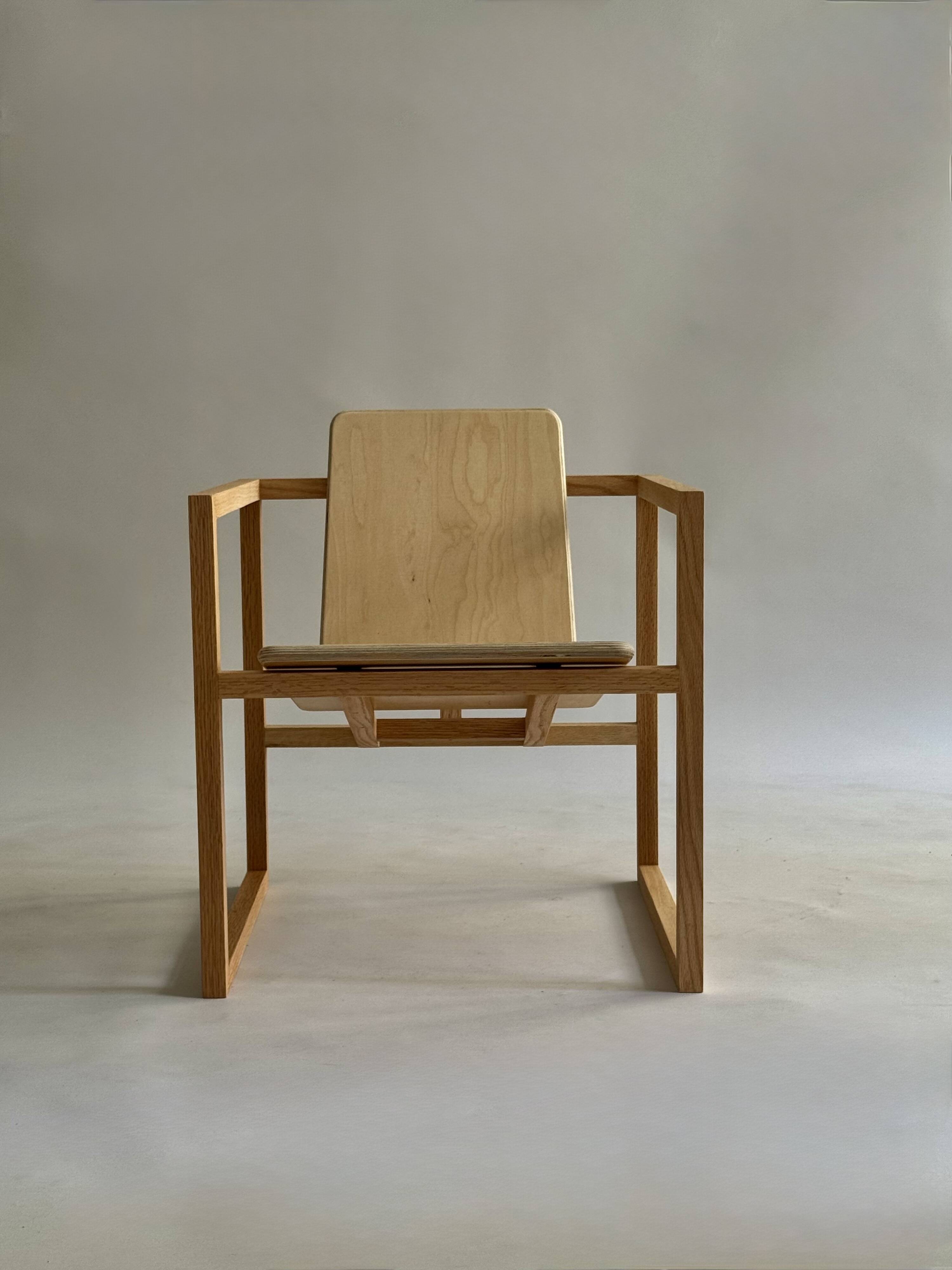 Pair of handmade wooden armchairs