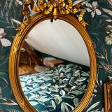 Miroir ancien ovale a fronton noeud