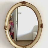 Mirror in wood and stucco with gilded highlights 20th century
