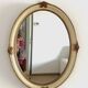 Miroir en bois et stuc a rehaut doré XX siècle