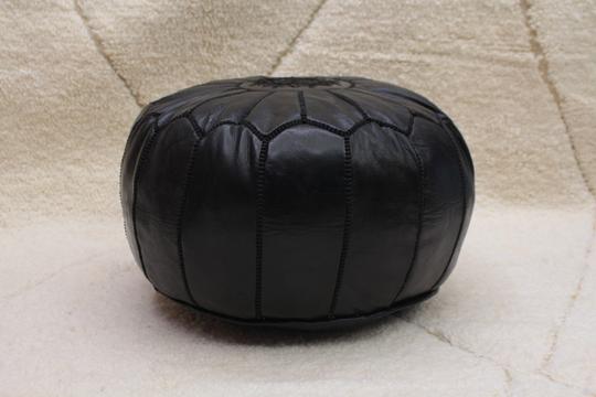 Moroccan pouf in dark black leather