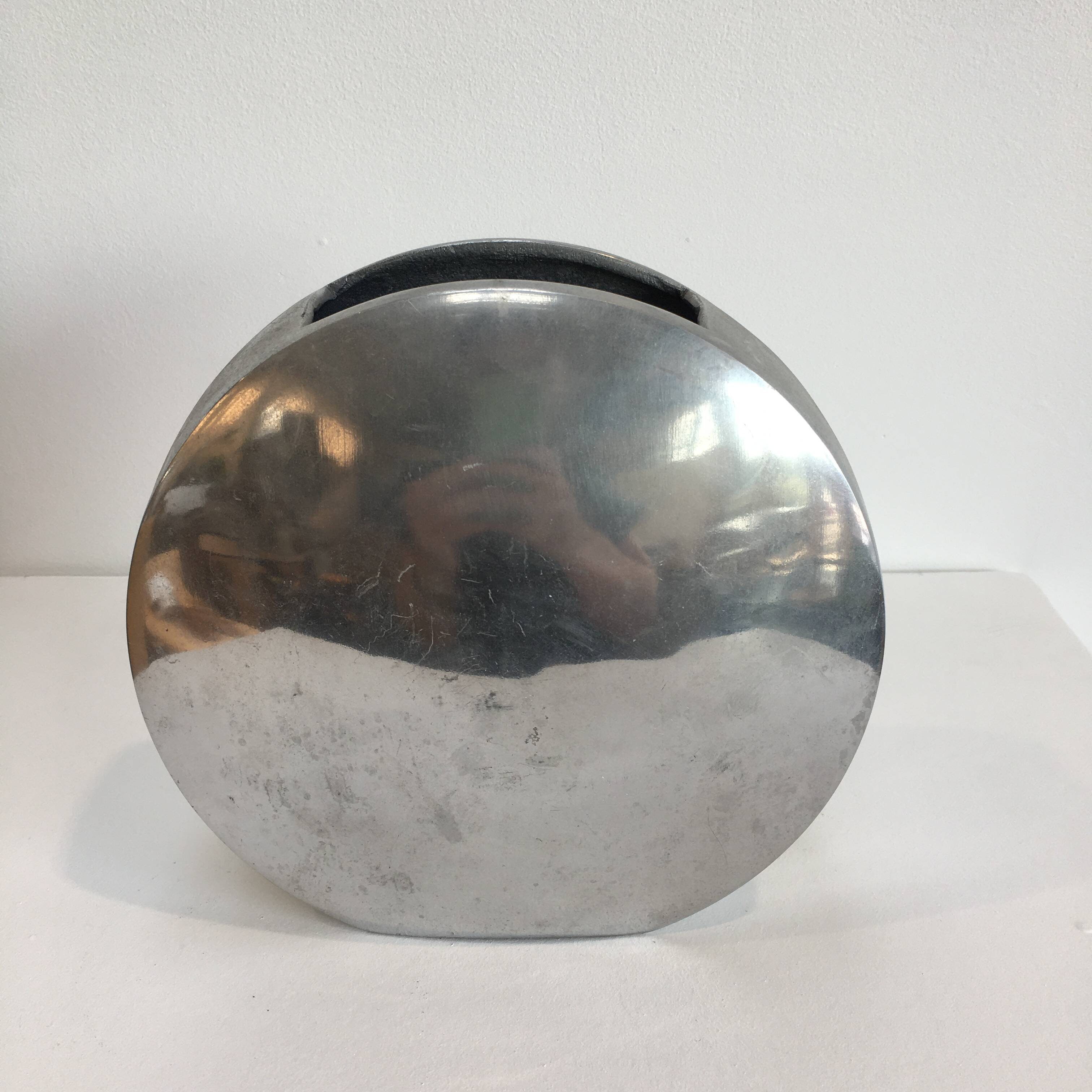 Series of two 70s style aluminum vases