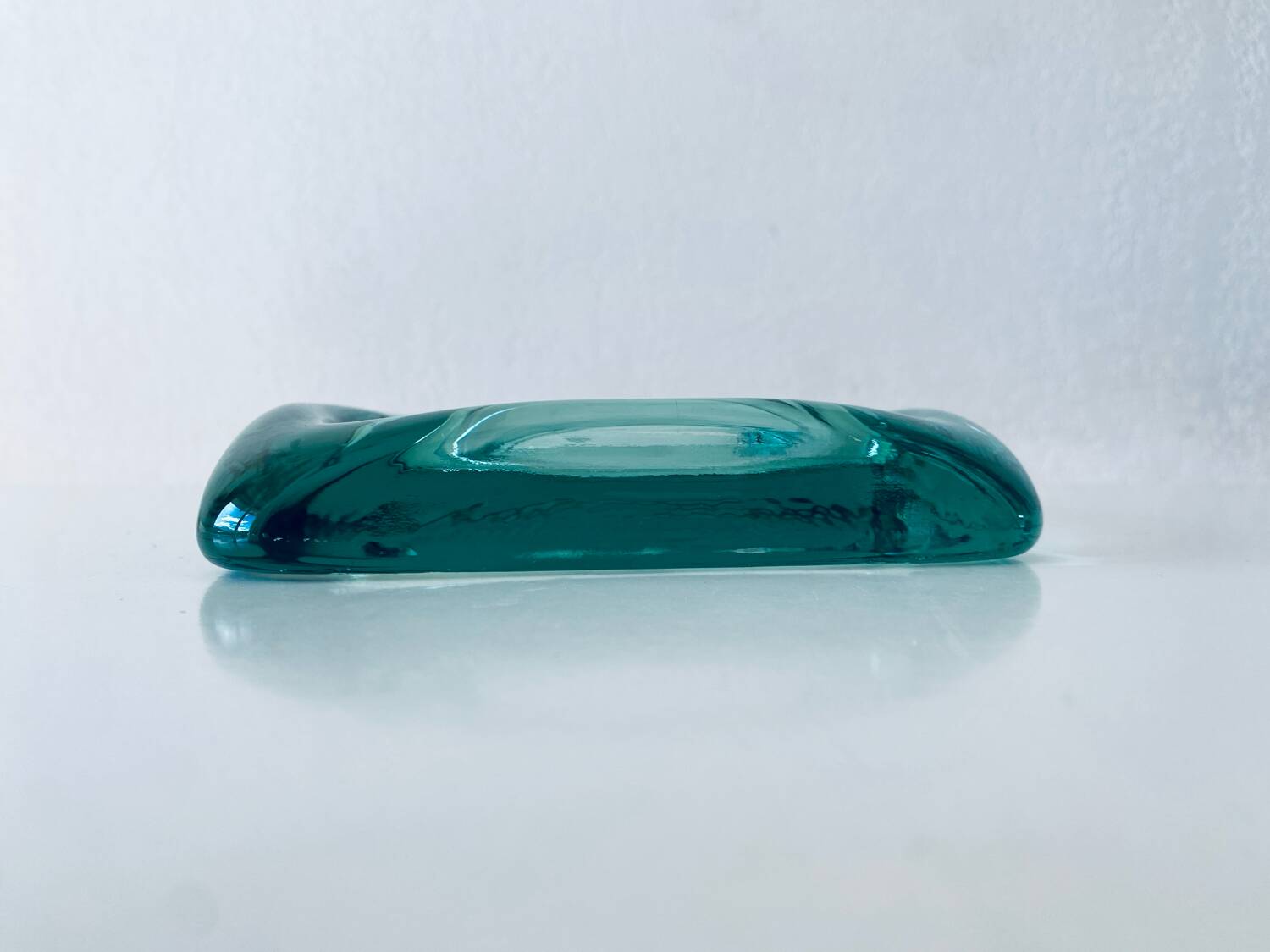 Glass tiled pocket emptier