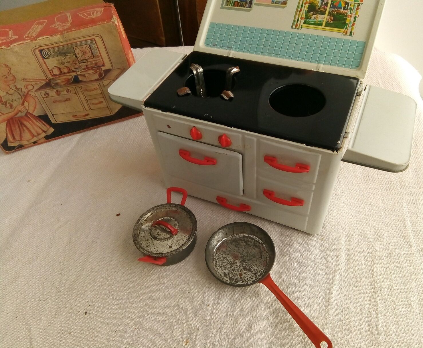 Toy old cook doll sheet metal