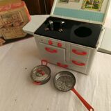 Toy old cook doll sheet metal