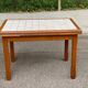 Dining table or farmhouse kitchen style with solid wood and tiles.