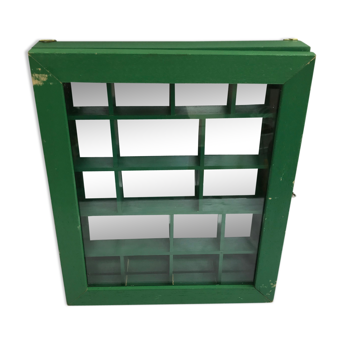 Old green wood showcase