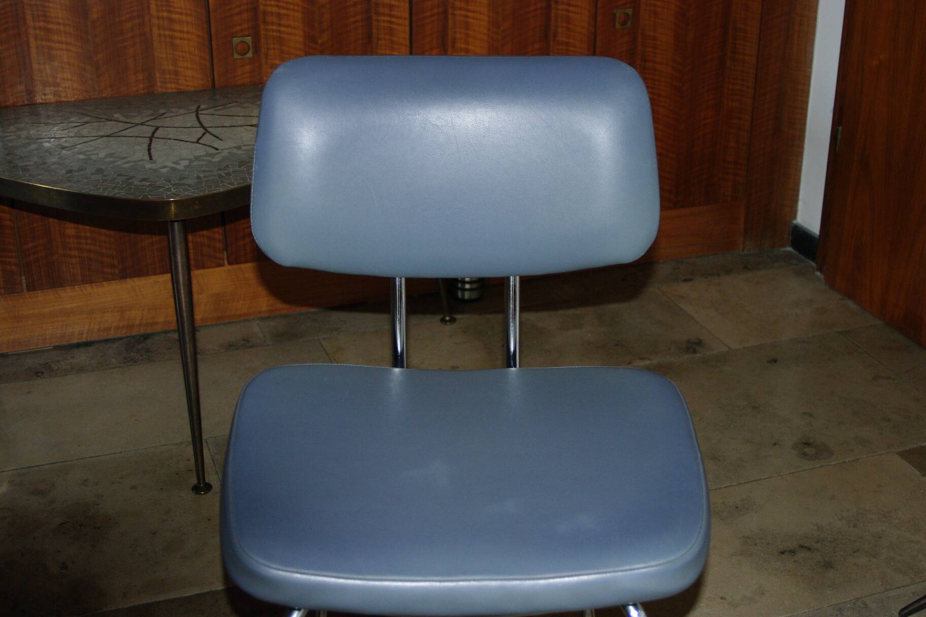 Vintage ski and chrome chair 1950