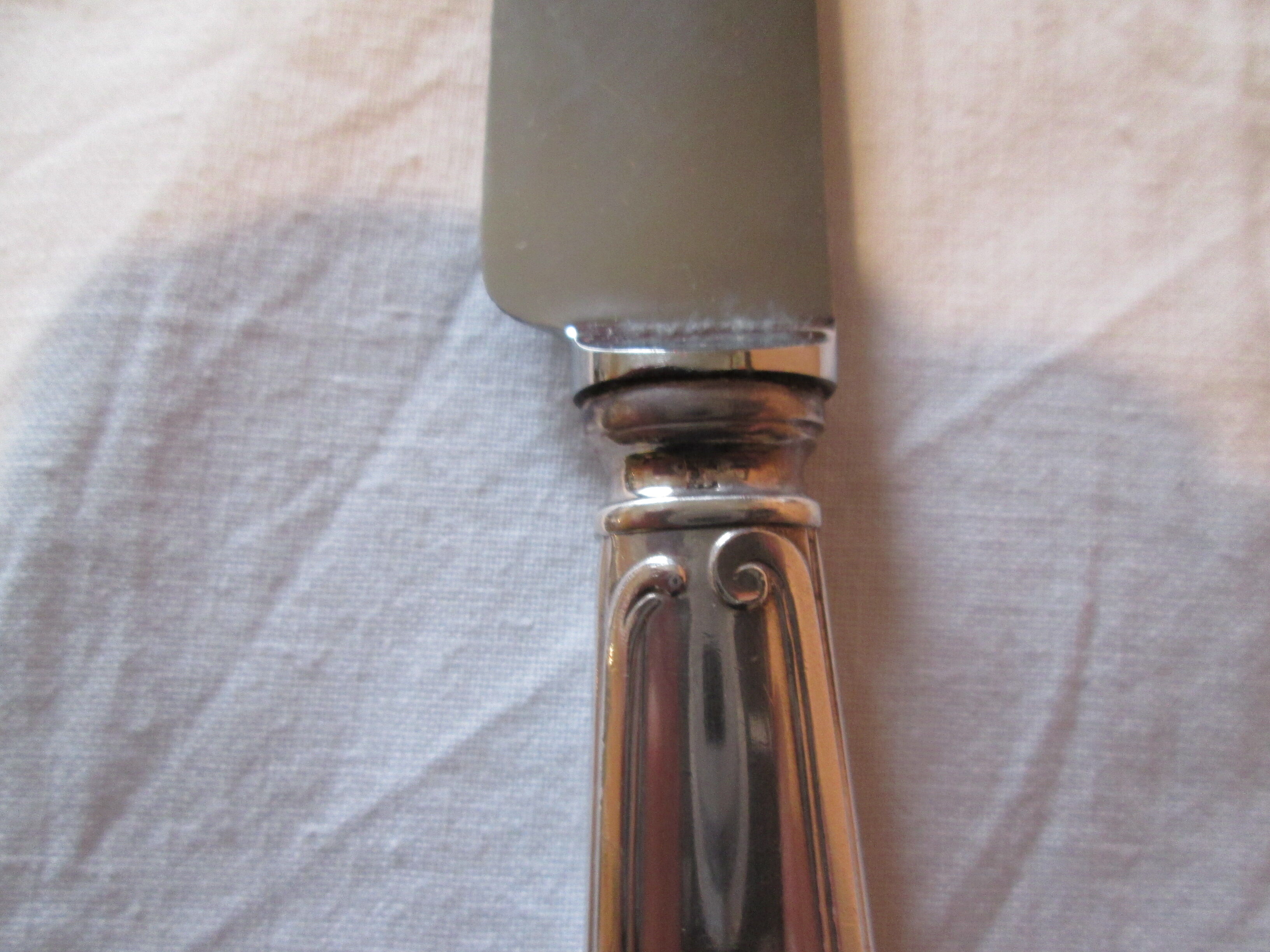12 silver metal knives