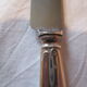 12 silver metal knives