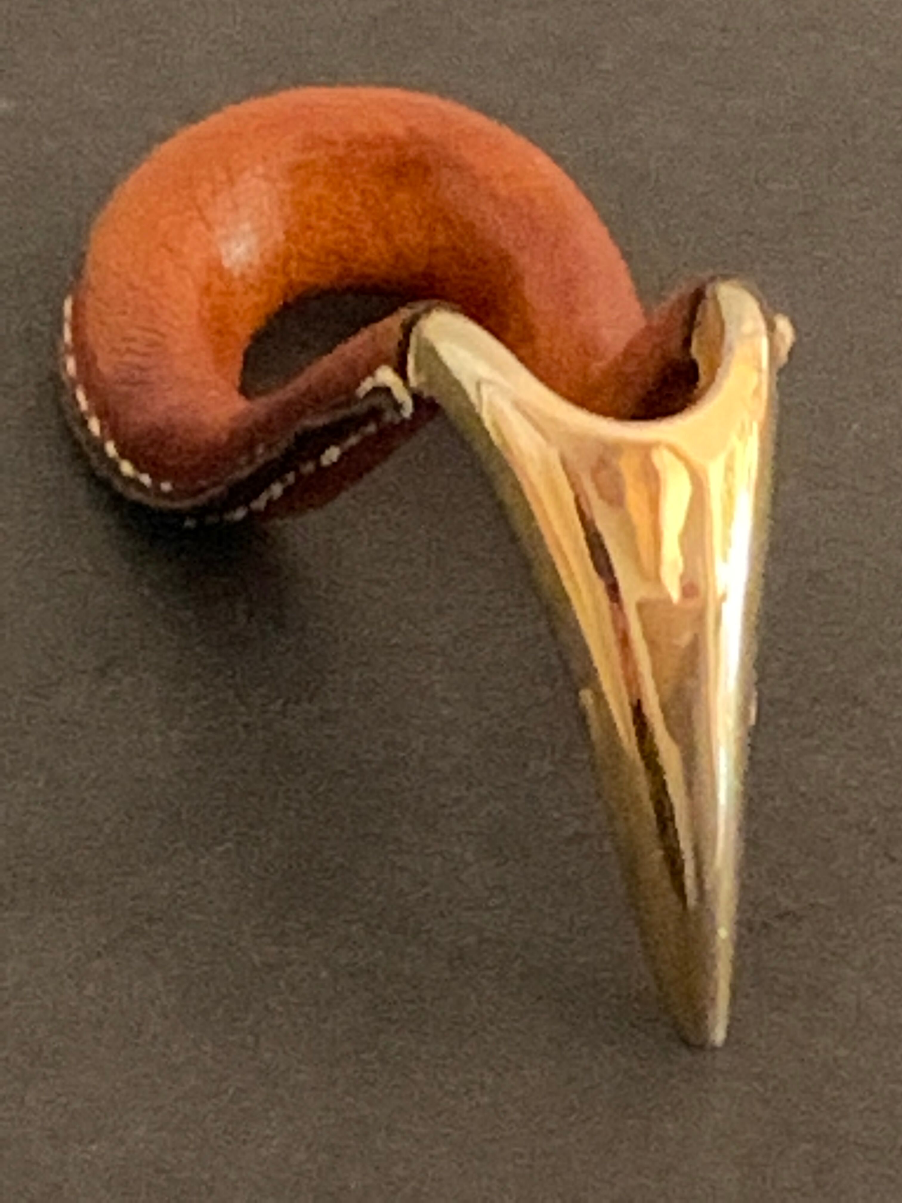 Carl Auböck pipe rack in leather and bronze, 1963