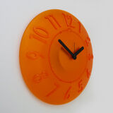 Guzzini orange wall clock from the 1980s