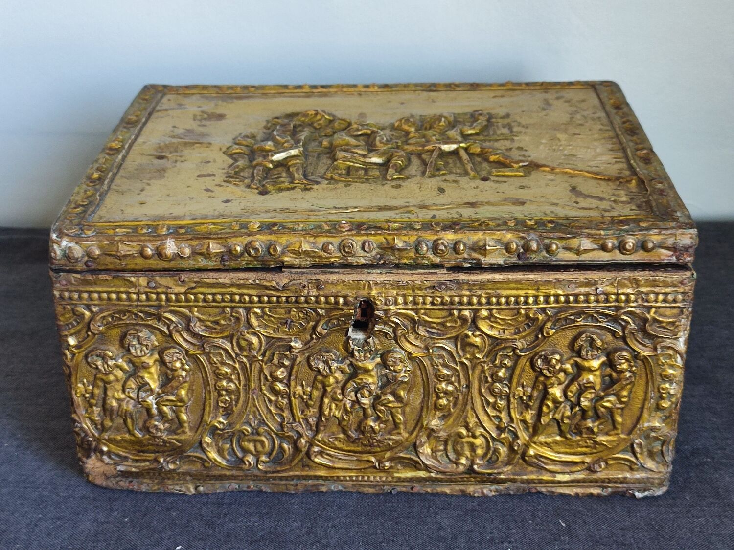 Old wooden box/casket covered with brass