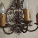 French triple wall sconce in wrought iron, early 20th century.