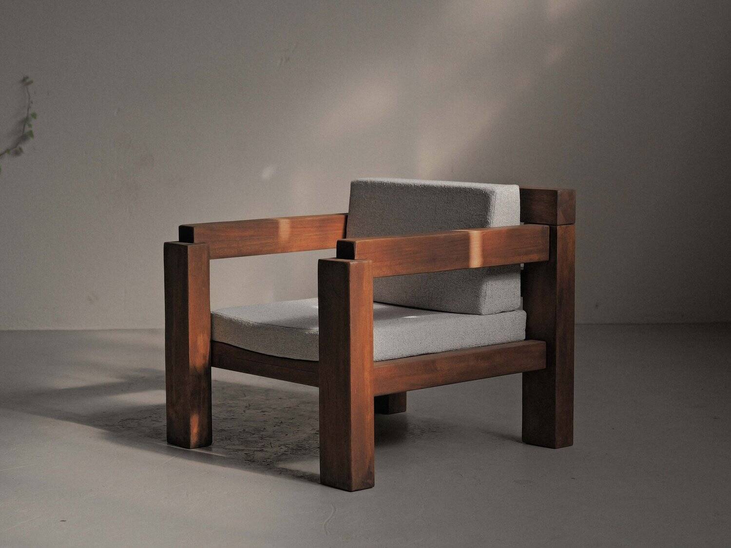 Handcrafted armchair in solid wood and fabric, 1980s-90s.