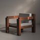 Handcrafted armchair in solid wood and fabric, 1980s-90s.