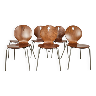 Six stackable dining chairs by Calligaris