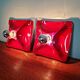 Pair of Space Age wall sconces in red ceramic, 1970.