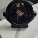 Vintage round pivoting mirror in black, retro style from the 70s/80s.