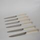 set of 6 small white bakelite knives 1960