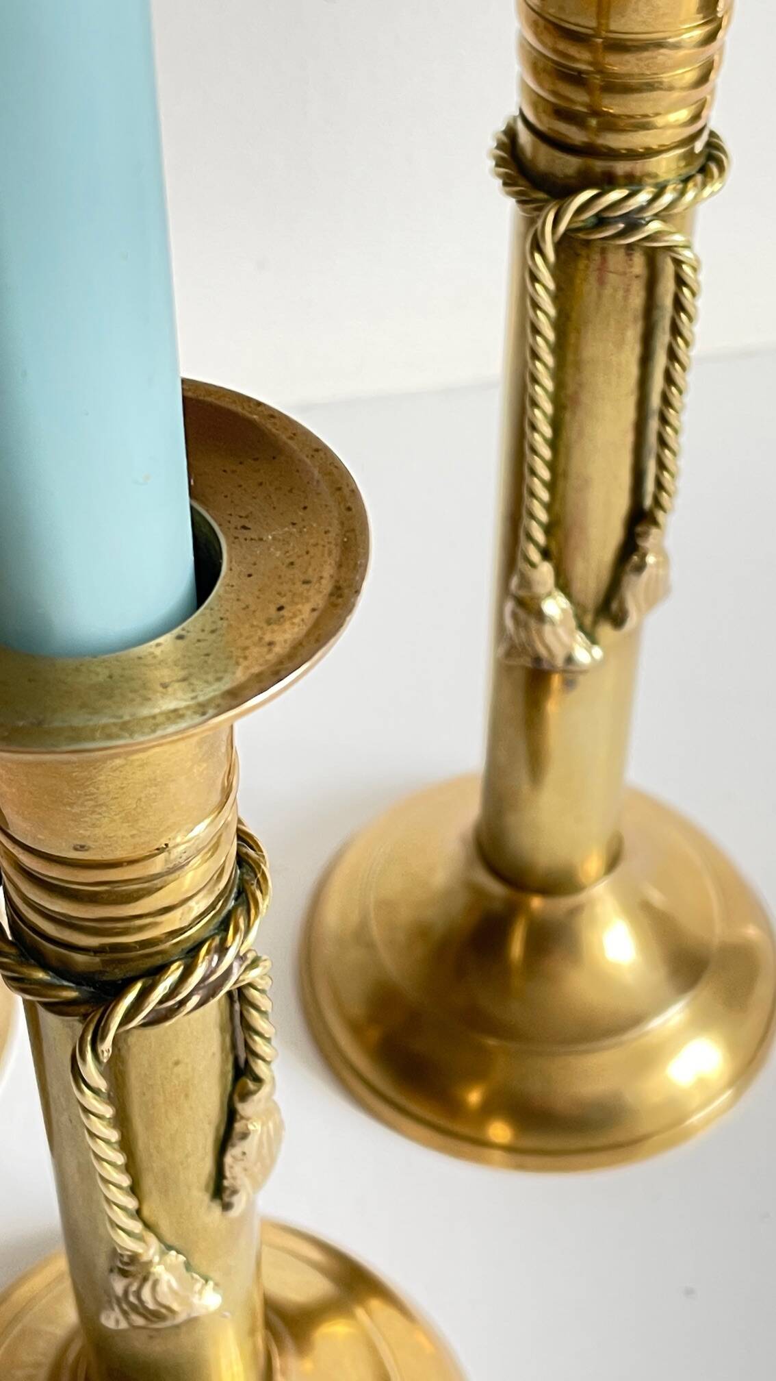 Trio of vintage knotted candlesticks brass