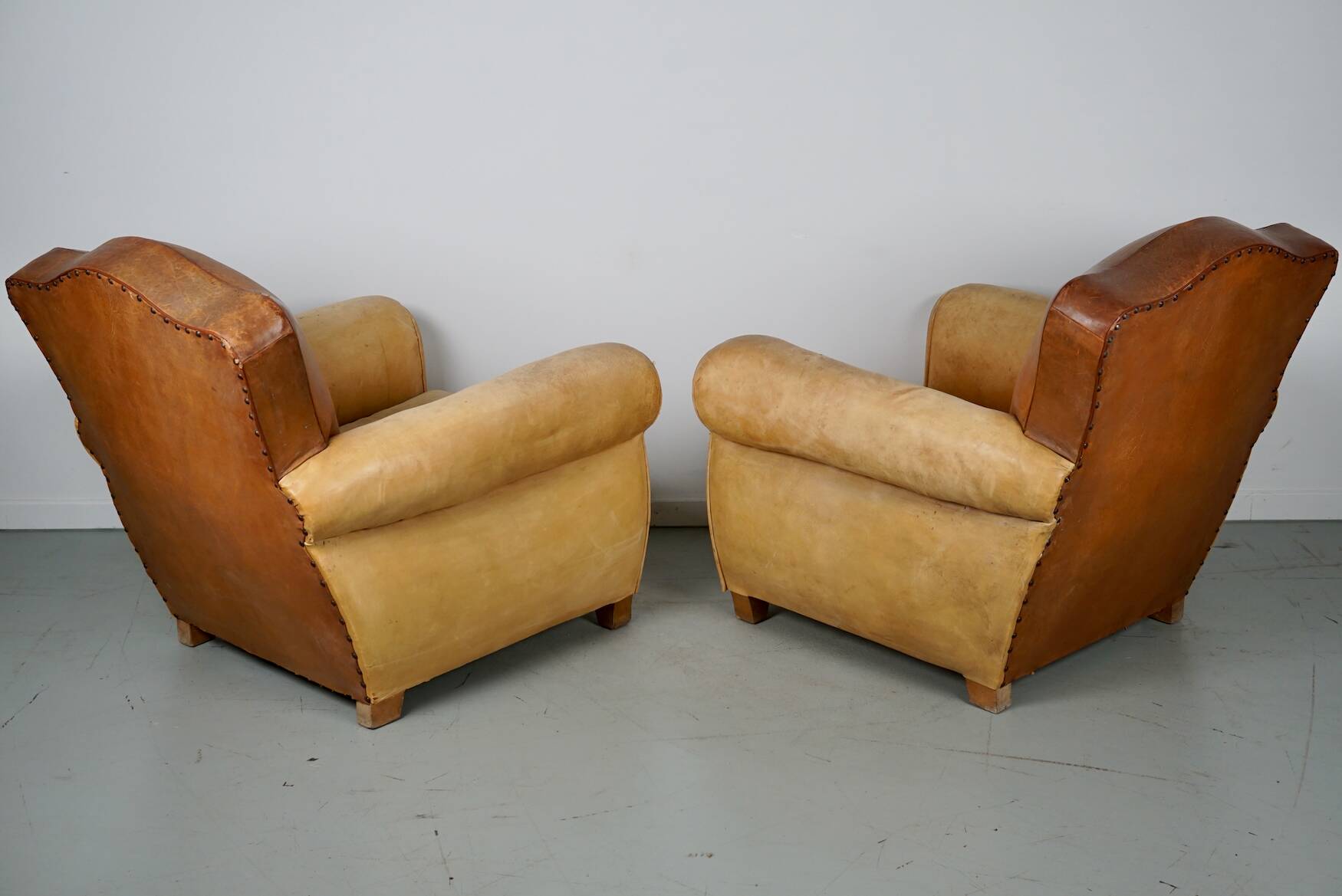 Pair of French Cognac Moustache Back Leather Club Chairs, 1940s