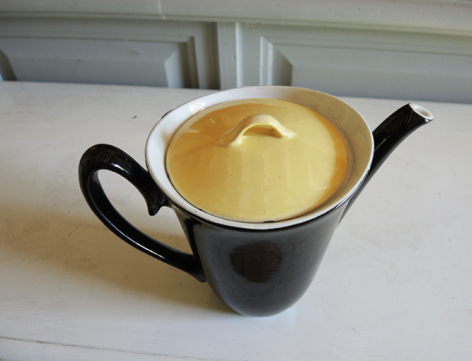50s black and yellow ceramic teapot