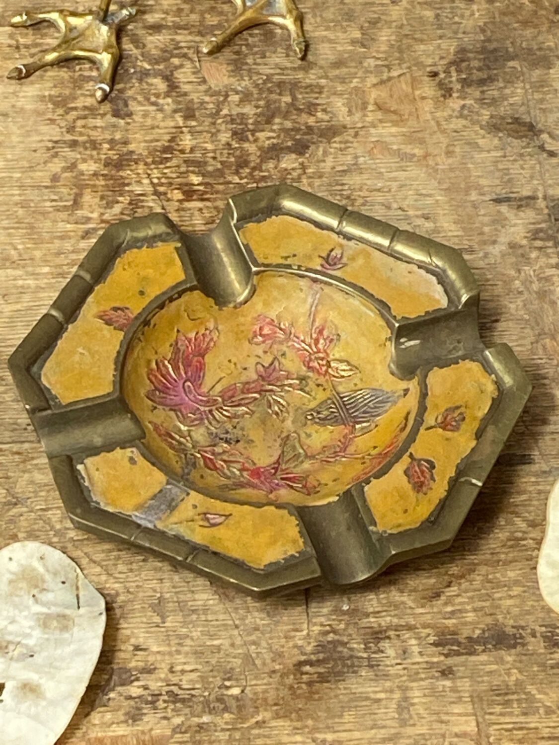Enameled brass ashtray with floral decoration