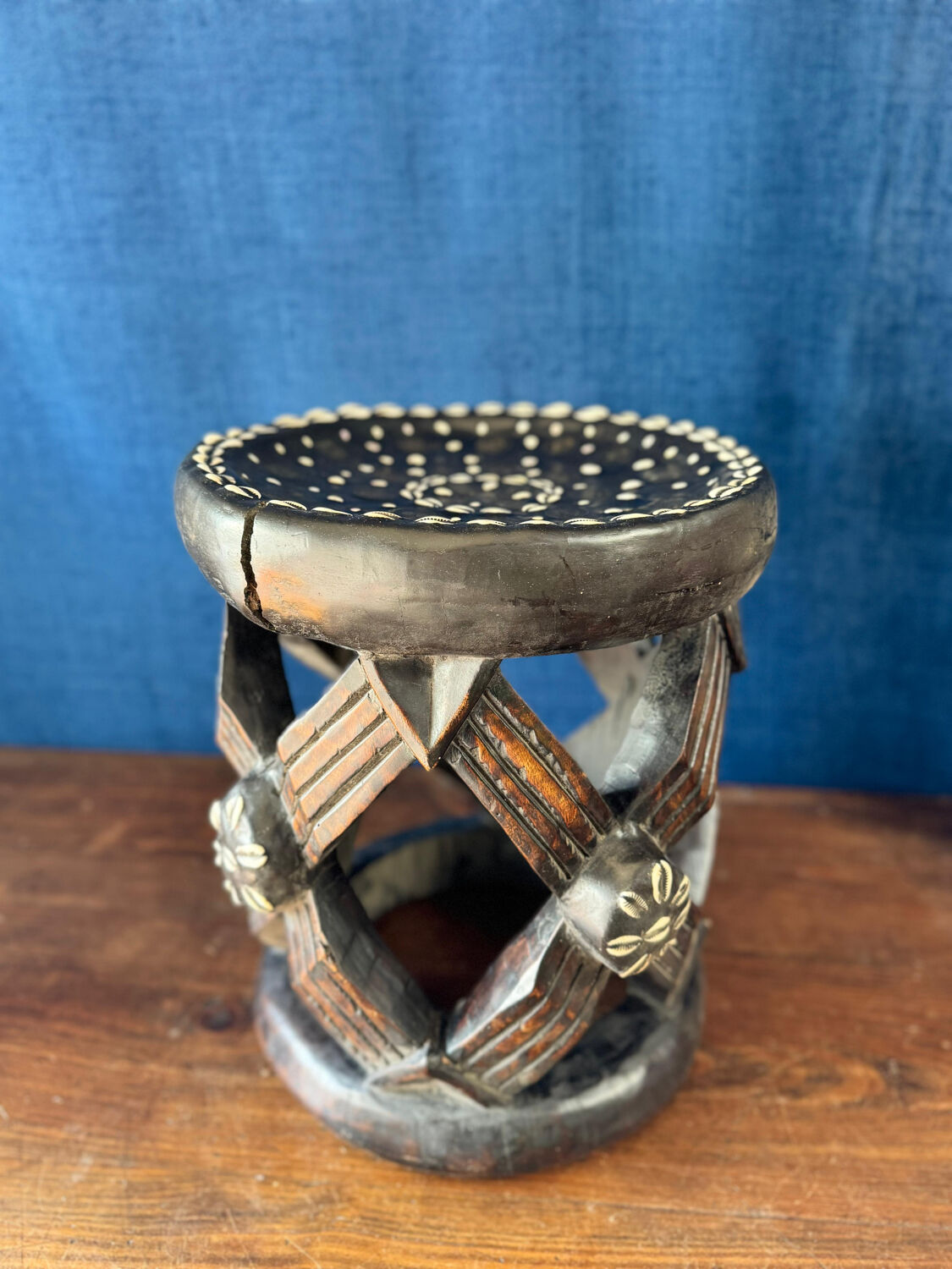 Traditional African stool. Hand-carved, richly decorated.