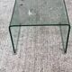 Vintage Italian coffee table with curved glass from the 1980s.