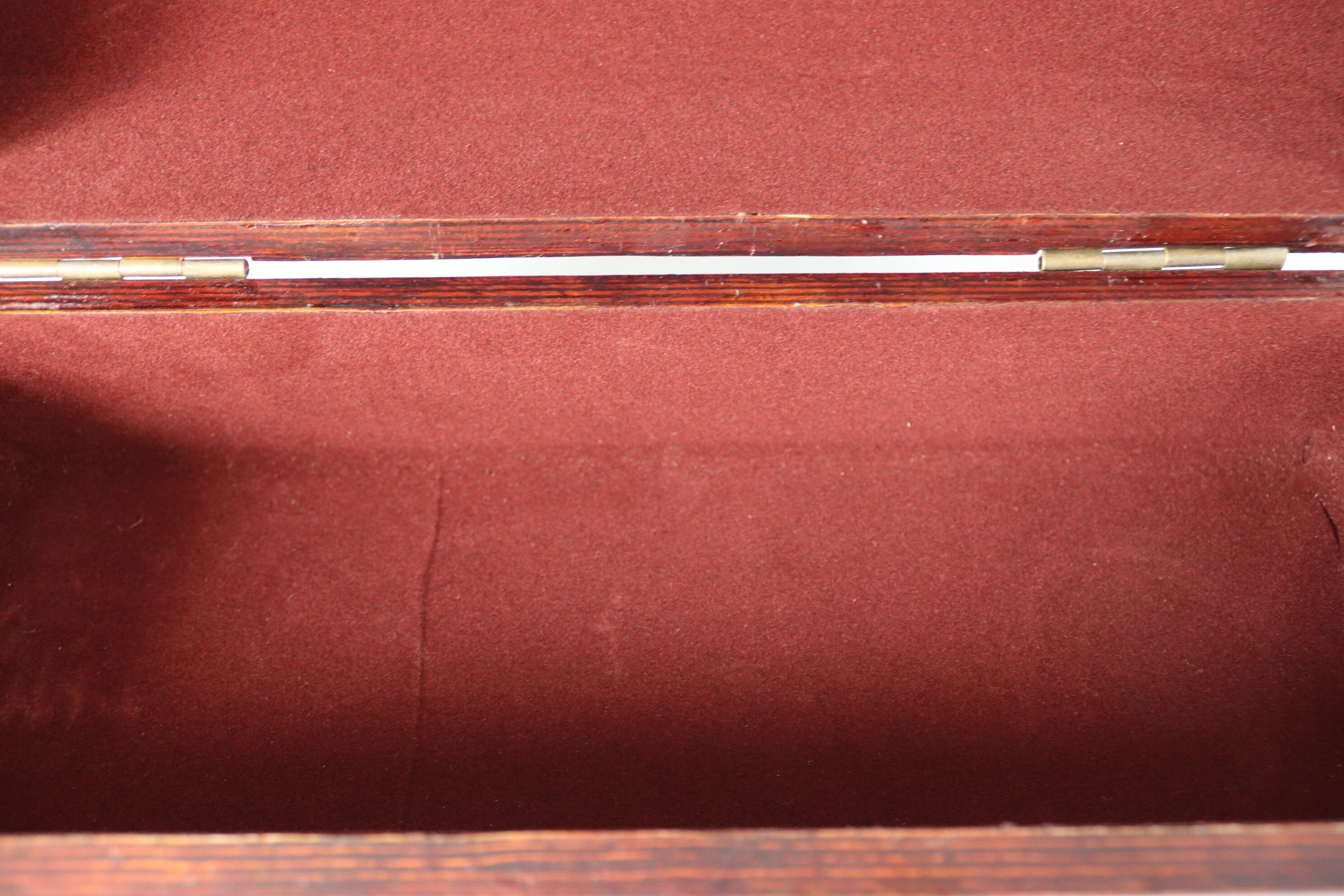 small wooden and brass trunk