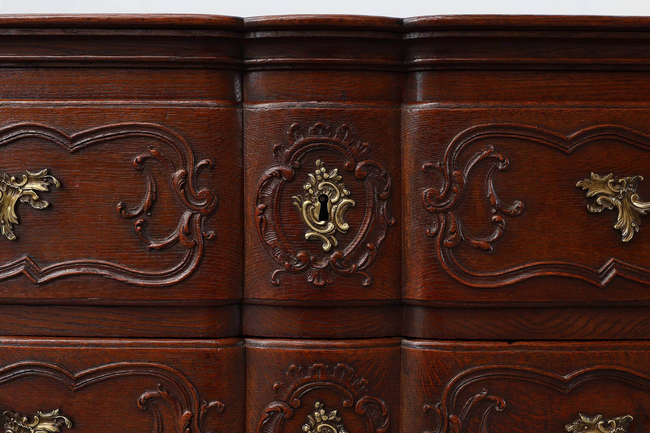 French 18th Century hand crafted oak chest of drawers in Louis XV style