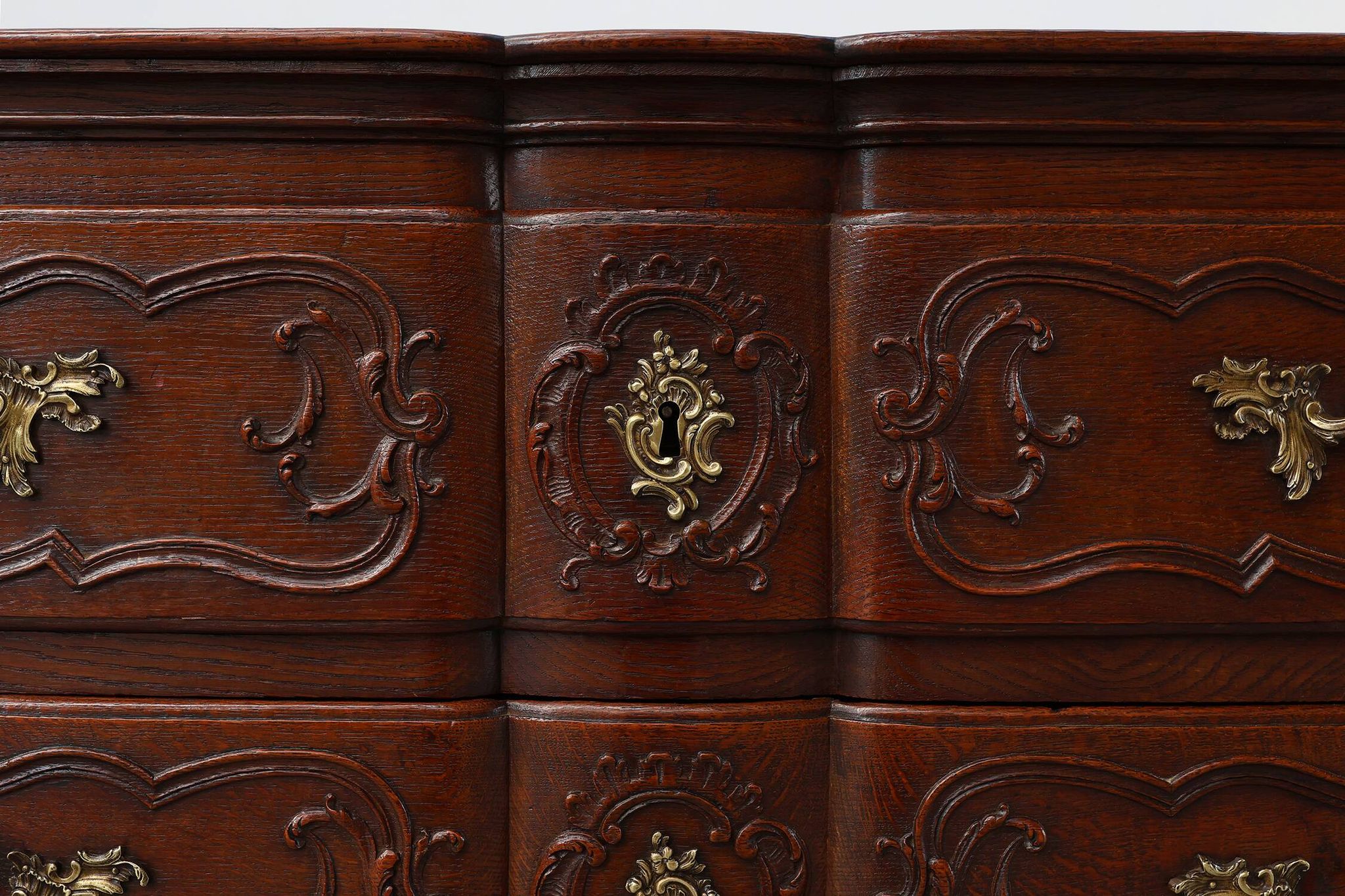 French 18th Century hand crafted oak chest of drawers in Louis XV style