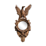 Miroir en bois doré Empire à décor d’aigle 40x97cm
